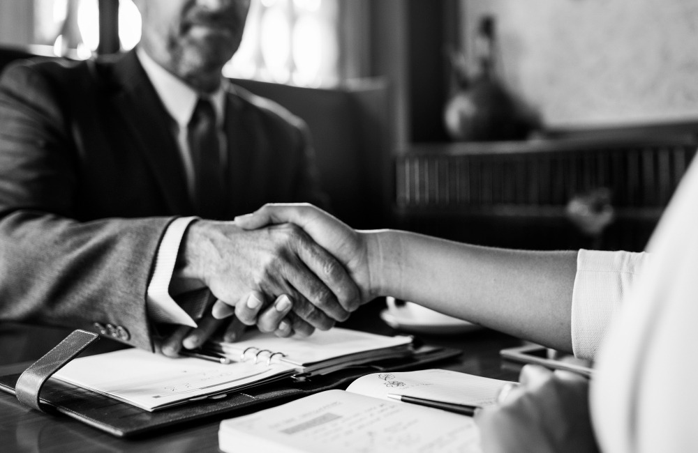 The mediator and client shook hands after the meeting